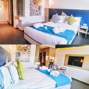 Habitación de hotel con 2 camas y TV en Relax Hotel Casa Voyageurs, en Casablanca
