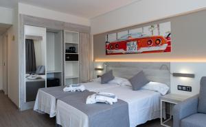Postel nebo postele na pokoji v ubytování Medplaya Hotel Bali