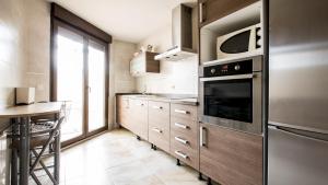 Kuchyň nebo kuchyňský kout v ubytování Casa Rural Galana