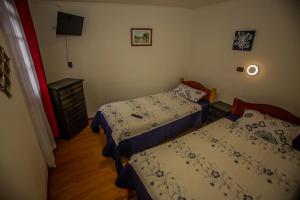 Cama o camas de una habitación en Residencial la Cabaña
