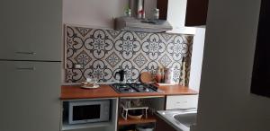 Kuchyňa alebo kuchynka v ubytovaní Mansarde & Suite Maison 1706 Lago Orta