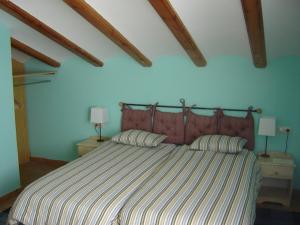 A bed or beds in a room at Mas De Borràs