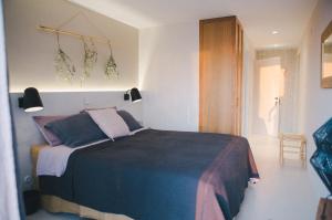 Ein Bett oder Betten in einem Zimmer der Unterkunft Eco-lodge Villa Epicurea