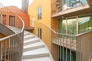 a set of stairs leading up to a building at Bairro Alto Premium Apartment in Lisbon