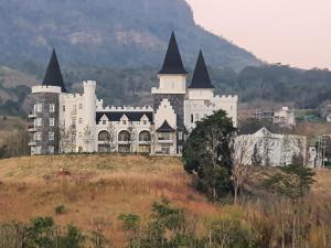 a castle sitting on top of a hill at The Castell Condo by Nutthiwan room 912 and 921 in Khao Kho