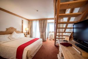 TV a/nebo společenská místnost v ubytování Hotel Grifone