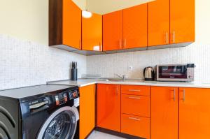 Kuchyň nebo kuchyňský kout v ubytování Апартаменты WOW-hotel + 15 fotografií