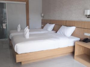 Postel nebo postele na pokoji v ubytování Luxe Villa