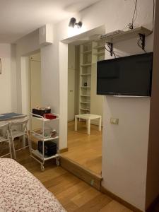TV a/nebo společenská místnost v ubytování Resort Dependance di Villa Rosa Maria