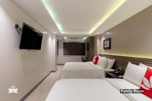 Кровать или кровати в номере Hotel Inigo