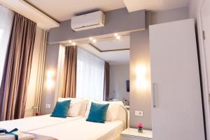 Katil atau katil-katil dalam bilik di SPA Apartment Nalis