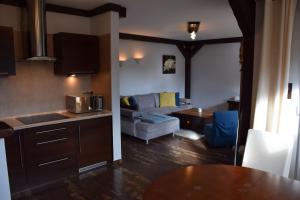 Kuchyň nebo kuchyňský kout v ubytování Apartamenty Bukowa Wisła + 30 fotografií