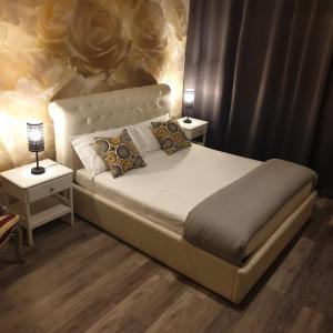Postel nebo postele na pokoji v ubytování Rigoletto Rental Rooms