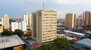 a tall building in the middle of a city at B&B HOTEL Uberlândia in Uberlândia