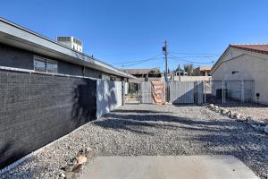 an alley with a fence and a building at 4 Mi to Beach Lake Havasu Apartment with Pool! in Lake Havasu City