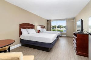 מיטה או מיטות בחדר ב-Stayable Lakeland