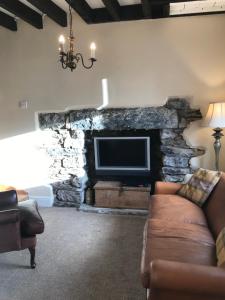 A seating area at Inglenook Cottage