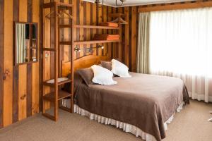 Postel nebo postele na pokoji v ubytování Del Pescador Hotel Cabañas