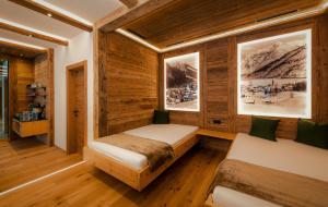 Krevet ili kreveti u jedinici u objektu alpdeluxe-Apartments Holzgau