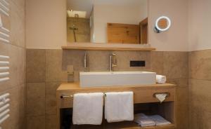Kúpeľňa v ubytovaní NATURPARKGUT - alpdeluxe Apartments