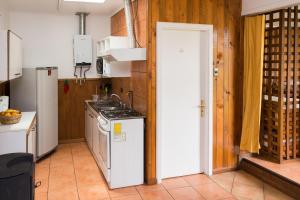 Kuchyň nebo kuchyňský kout v ubytování Del Pescador Hotel Cabañas