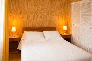 Postel nebo postele na pokoji v ubytování Del Pescador Hotel Cabañas