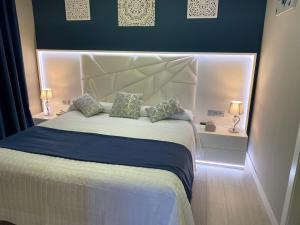 A bed or beds in a room at Los Bronces