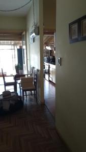 a room with a table and chairs and a dining room at carmon colon 1 ambiente y medio in Mar del Plata