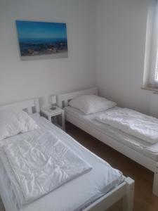 Postel nebo postele na pokoji v ubytování Strandzauber