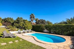 The swimming pool at or near Almancil Villa Sleeps 6 Pool Air Con