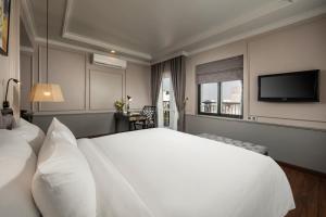 Ένα ή περισσότερα κρεβάτια σε δωμάτιο στο Imperial Hotel & Spa