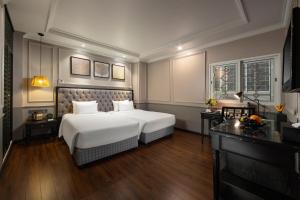 Ένα ή περισσότερα κρεβάτια σε δωμάτιο στο Imperial Hotel & Spa