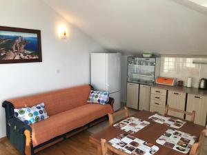 Kuchyňa alebo kuchynka v ubytovaní Gala Apartments