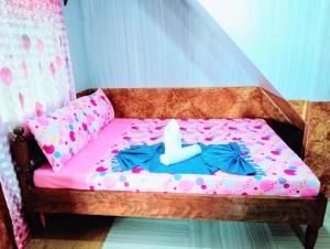 Ένα ή περισσότερα κρεβάτια σε δωμάτιο στο Blue Lagoon Inn and Restaurant