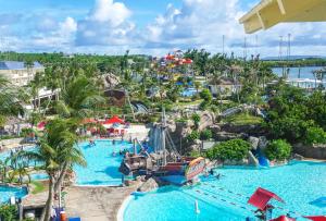 an aerial view of a water park at a resort at Pacific Islands Club Saipan in Chalan Kanoa
