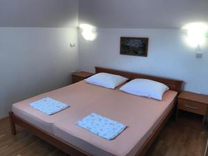 Posteľ alebo postele v izbe v ubytovaní Gala Apartments