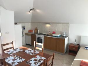 Kuchyňa alebo kuchynka v ubytovaní Gala Apartments