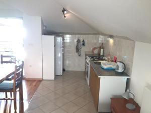Kuchyňa alebo kuchynka v ubytovaní Gala Apartments