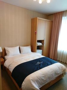 Postel nebo postele na pokoji v ubytování Incheon Aiport Airrelax hotel