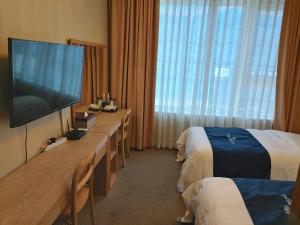 Postel nebo postele na pokoji v ubytování Incheon Aiport Airrelax hotel
