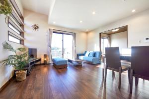 E-horizon Resort コンドミニアム名護B休息區