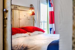 A bed or beds in a room at affittacamere - Là di Cesar