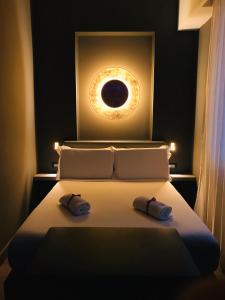 Postel nebo postele na pokoji v ubytování Palco Rooms&Suites