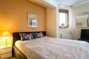 Posteľ alebo postele v izbe v ubytovaní Apartment Krupówki Premio