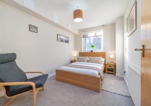 Giường trong phòng chung tại The Waverley Park Terrace Residence