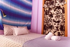 Łóżko lub łóżka w pokoju w obiekcie Sea & Wave Peña Apartament