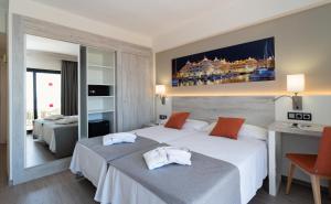 Postel nebo postele na pokoji v ubytování Medplaya Hotel Bali