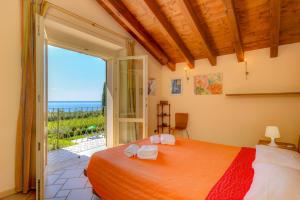 A bed or beds in a room at Residence Corte Ferrari -Ciao Vacanze-