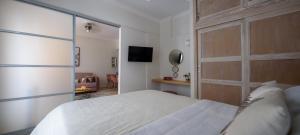 Posteľ alebo postele v izbe v ubytovaní Acropolis Exclusive Studio