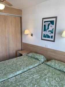 A bed or beds in a room at Apartamentos Maspalomas Foresta